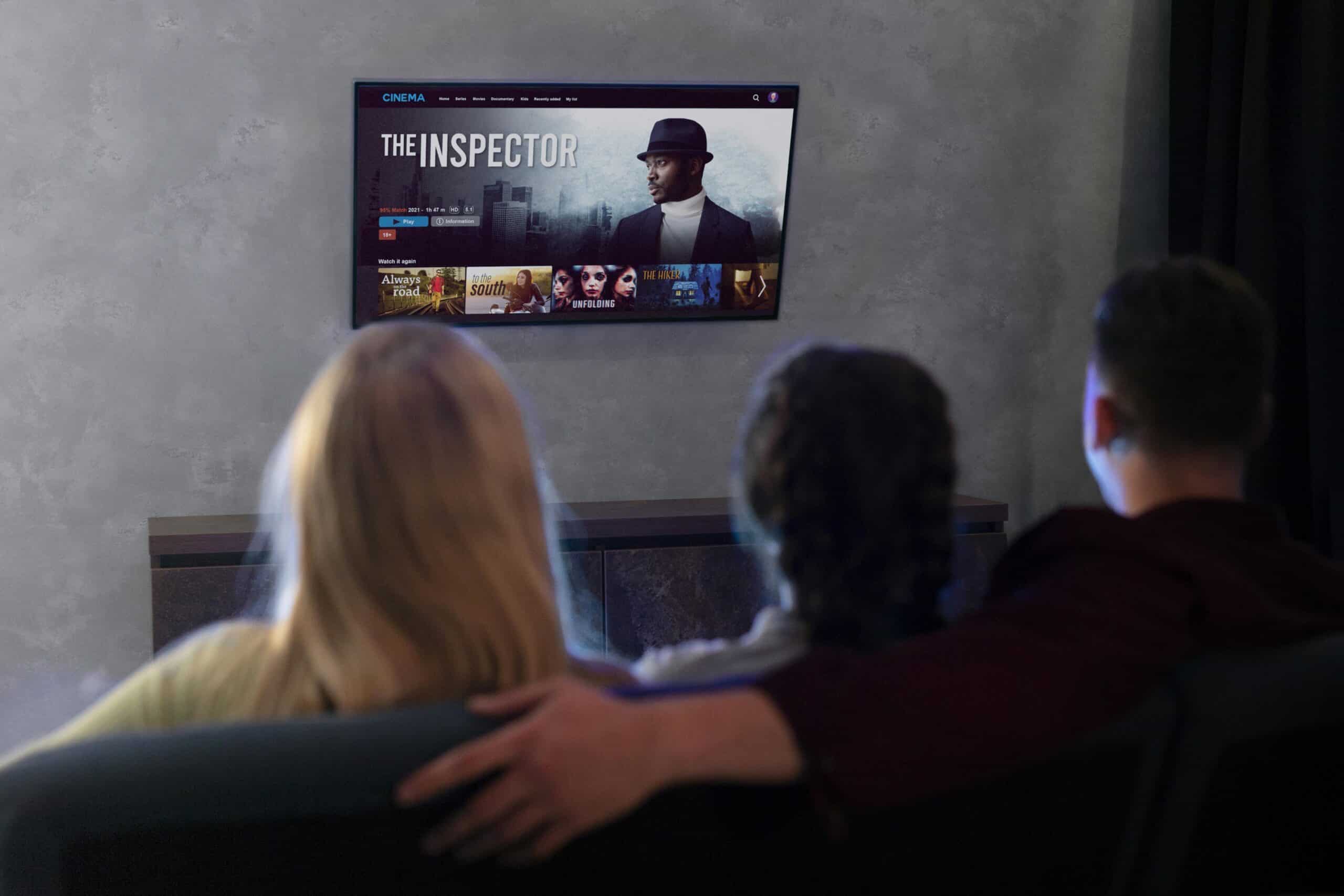 people watching streaming service together indoors scaled